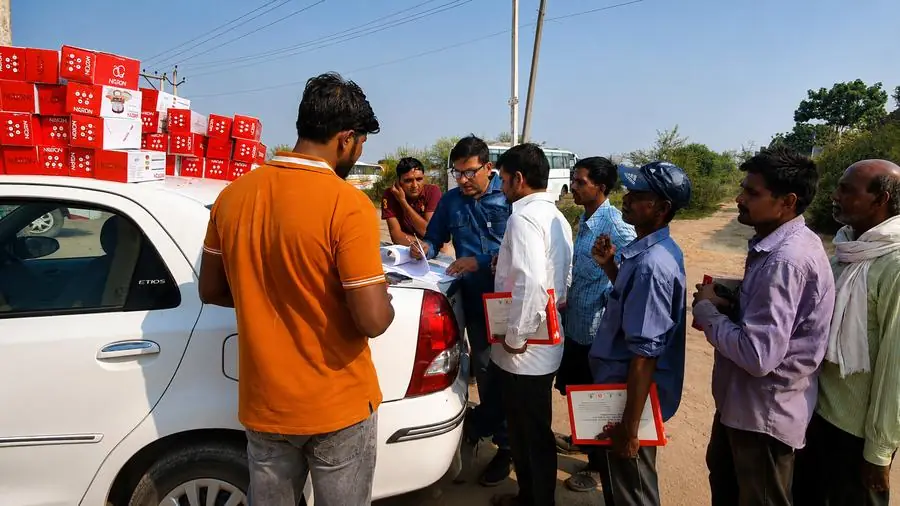 Onkar manager Sanjeet distributing Diwali gifts to deployed workers across client sites