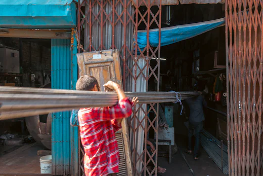 Worker handling industrial goods