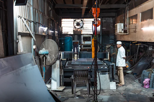 Worker on the industrial workshop floor